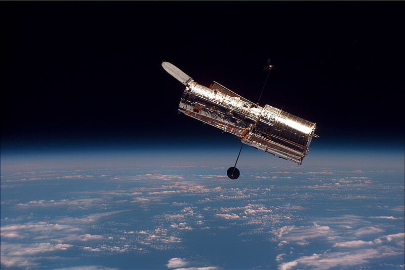 How did the Hubble Space Telescope open our eyes to the first galaxies of the universe?