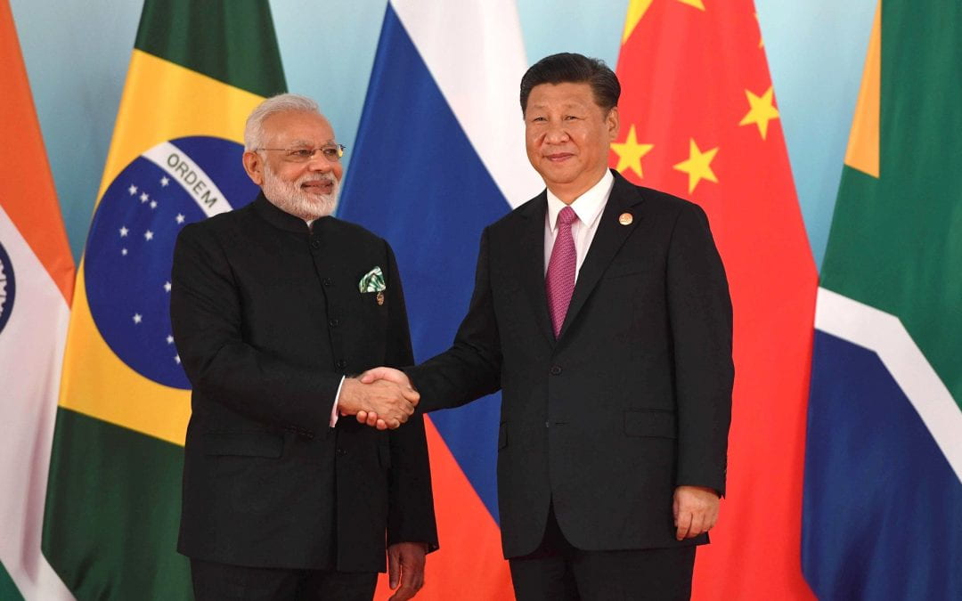 What is the cause of growing tension between China and India? 🔊