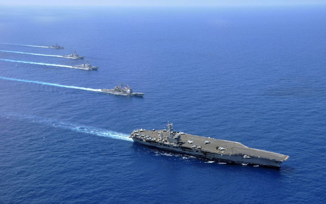 US and China are both raising the military stakes in the South China Sea